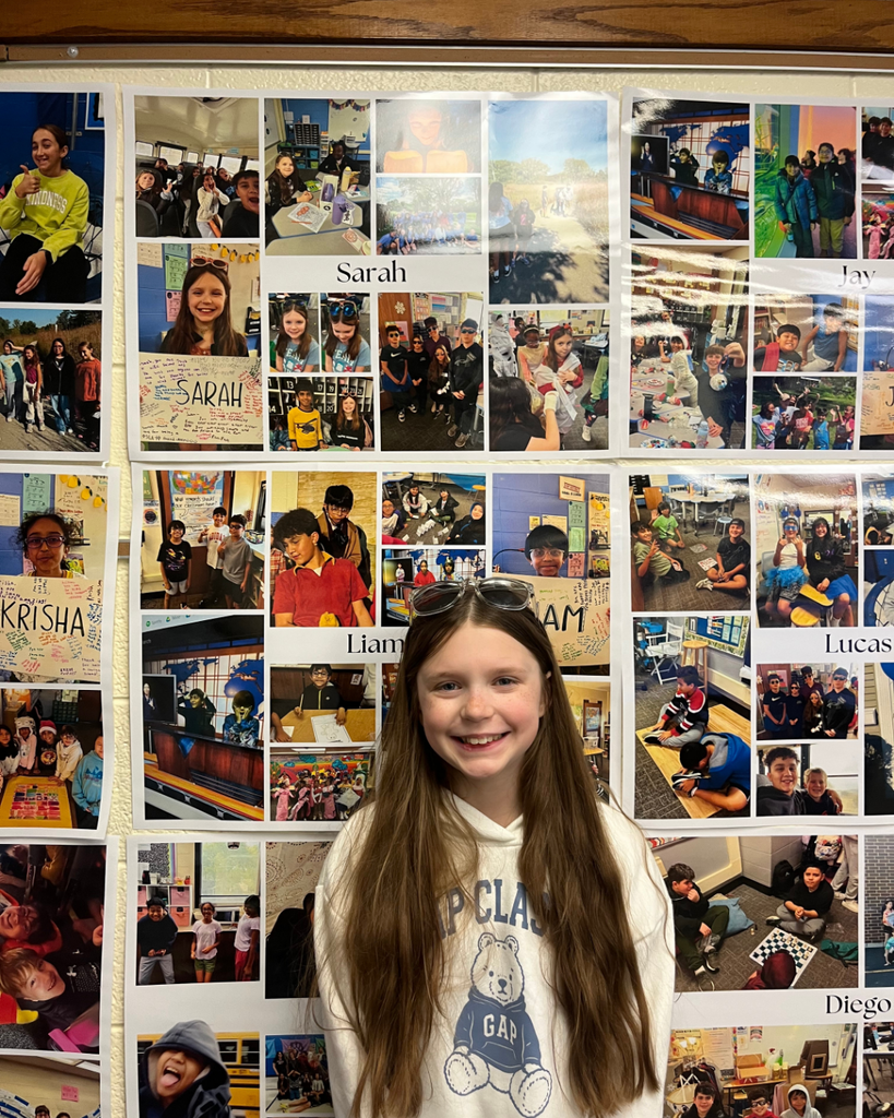 Student posing in front of her poster