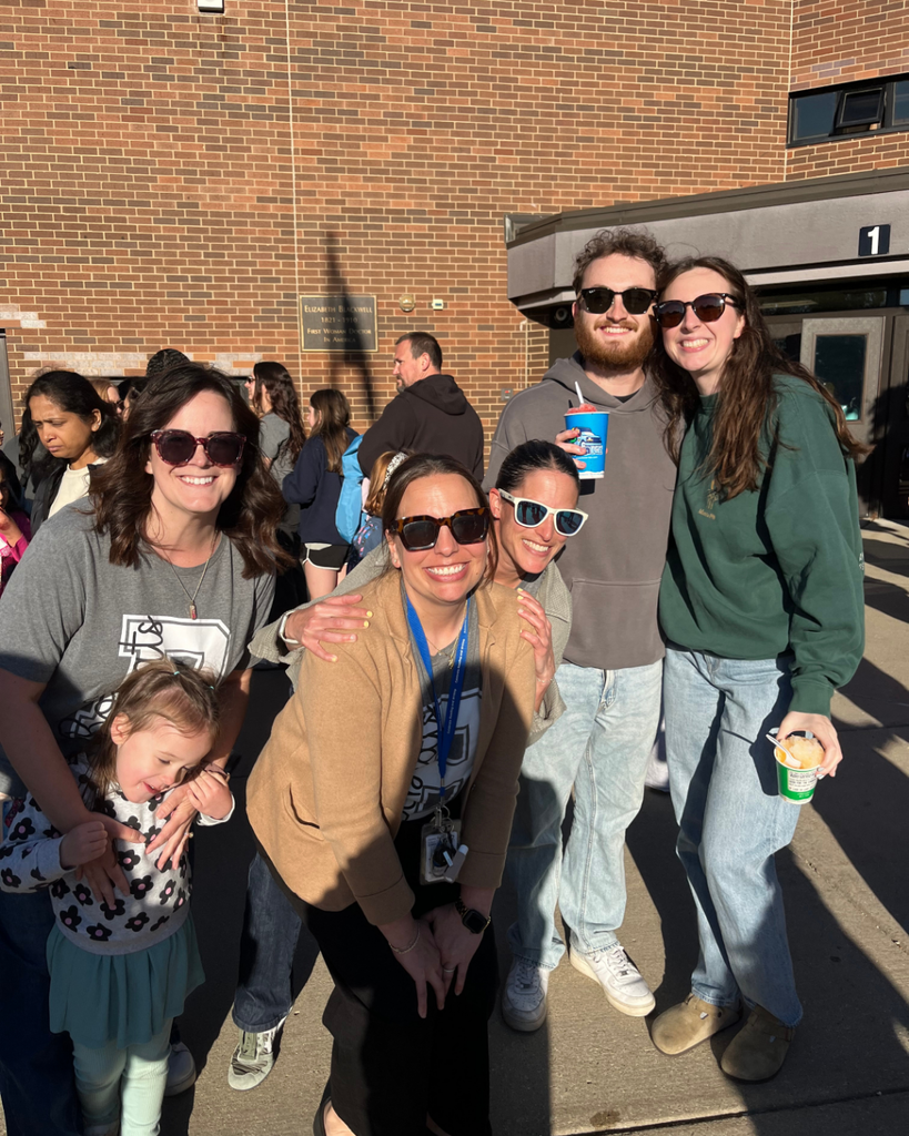 Staff members smiling together