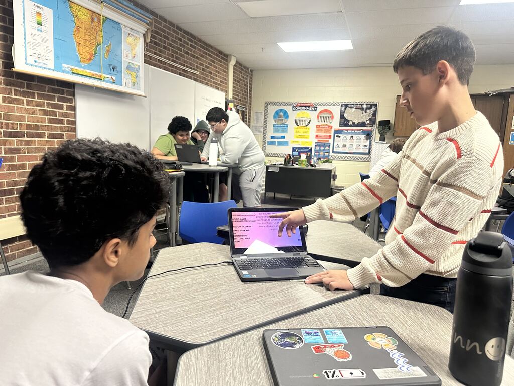 Students sharing their projects with each other