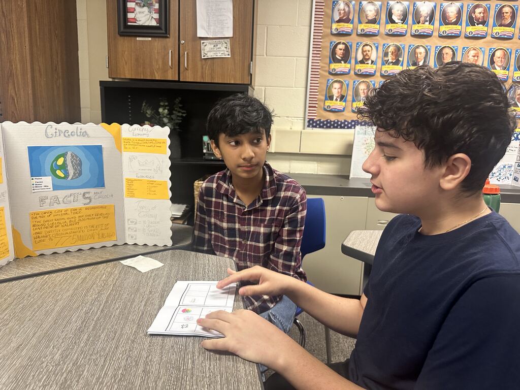 Students sharing their projects with each other