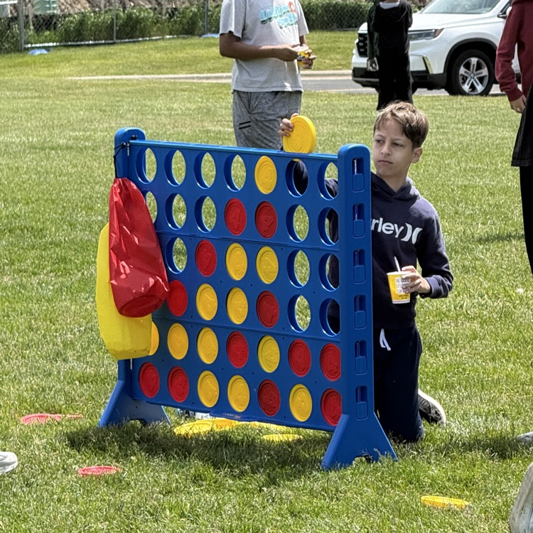 two boys playing connect four