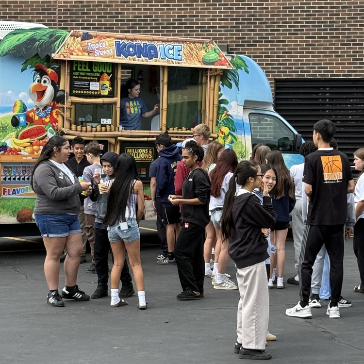 students standing at ice cream truck