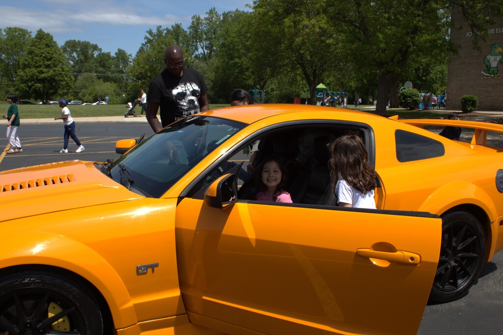 Students sitting in a car