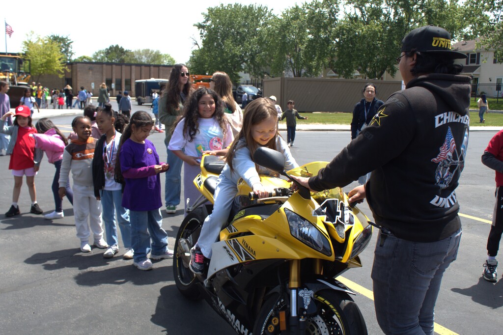 Student sitting on a motorcycle
