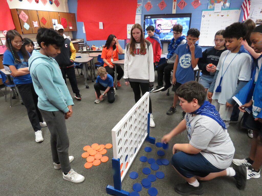 students playing connect four