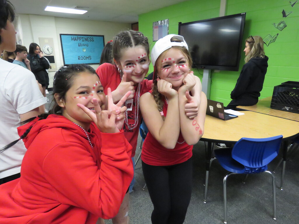 students posing as a team
