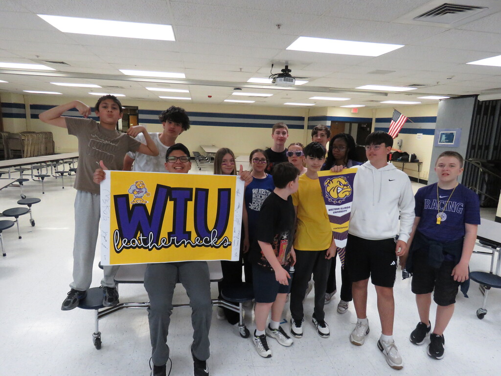 students posing as a team