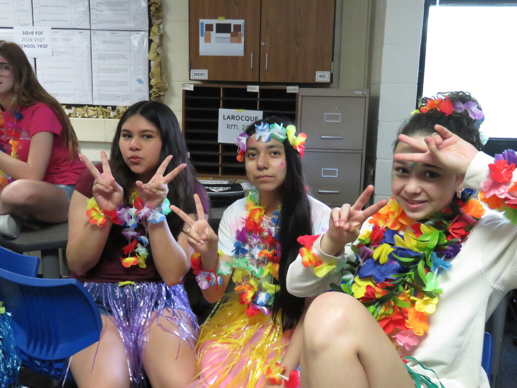 students posing as a team