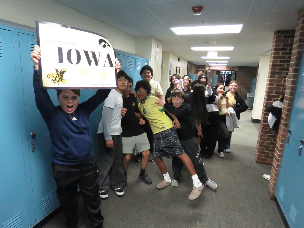 students posing as a team