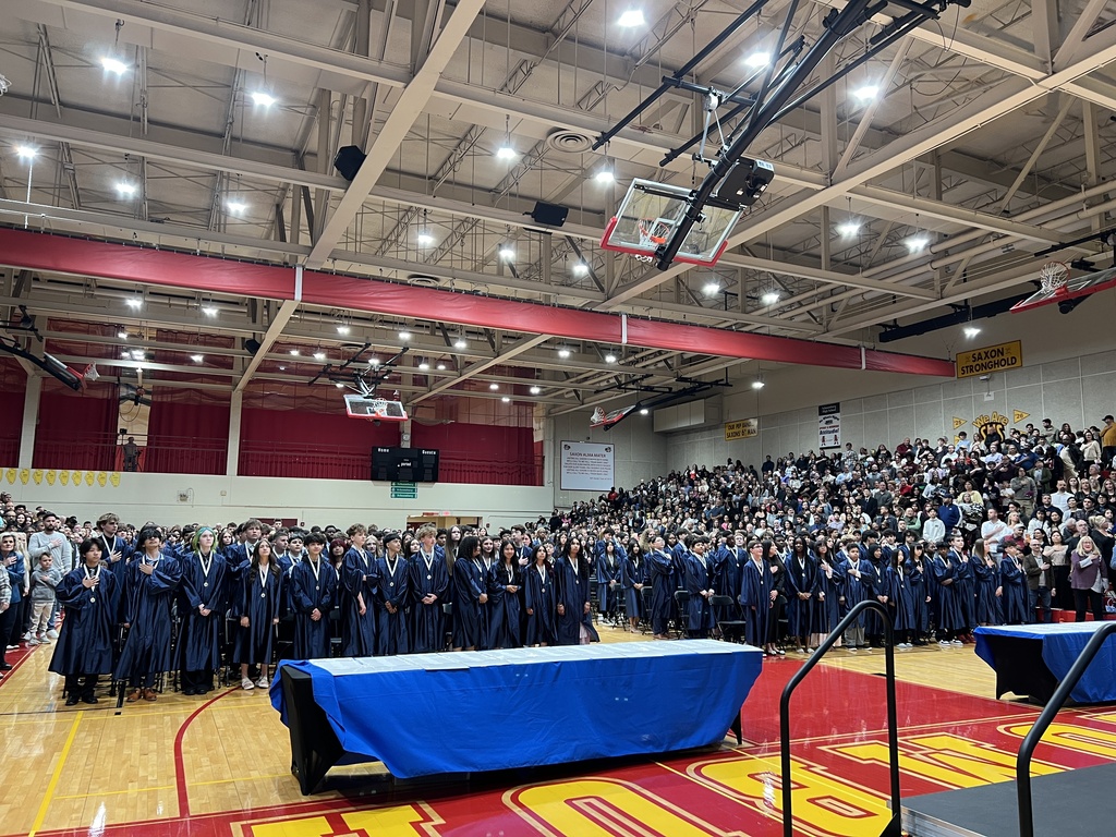 graduating class standing up