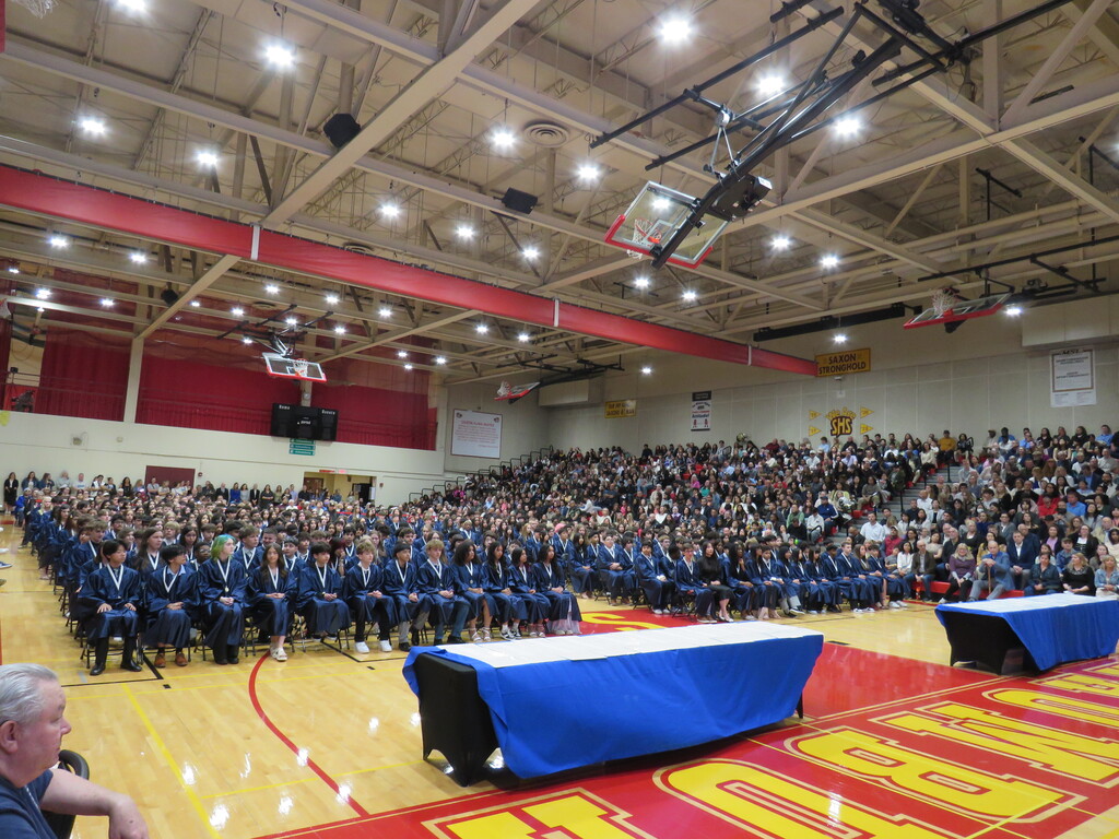 graduating class sitting down