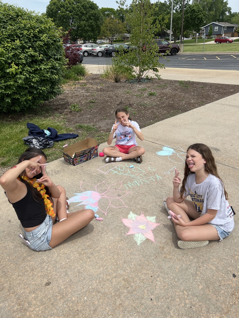 students doing chalk art