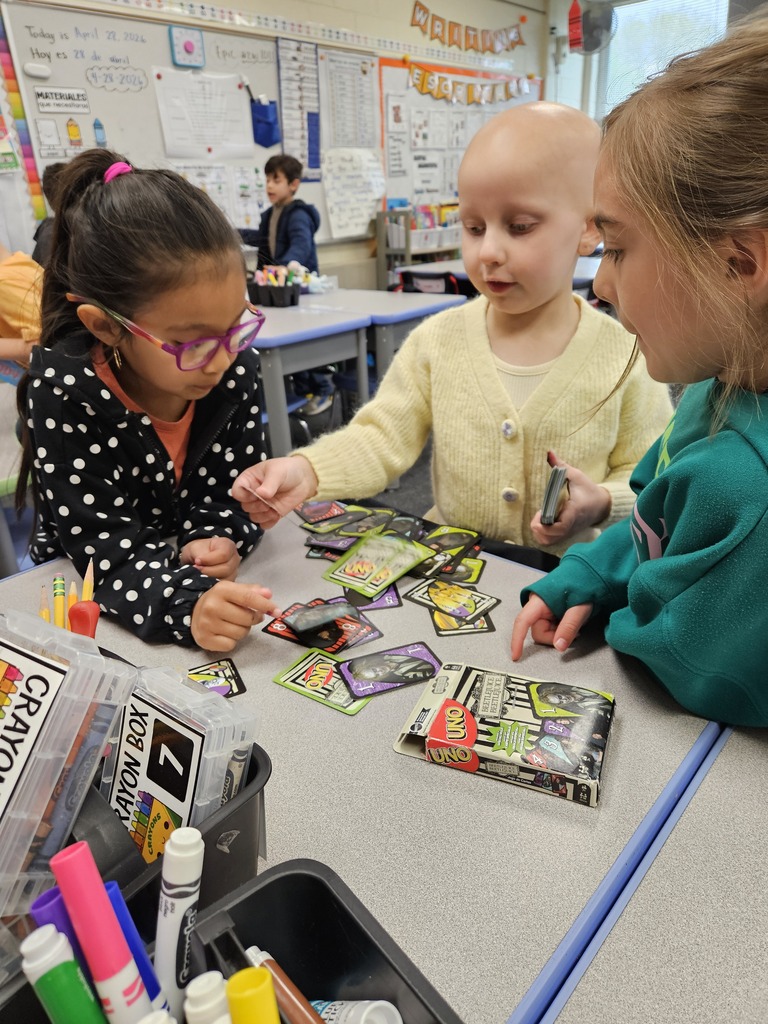 Kindergarten students playing uno