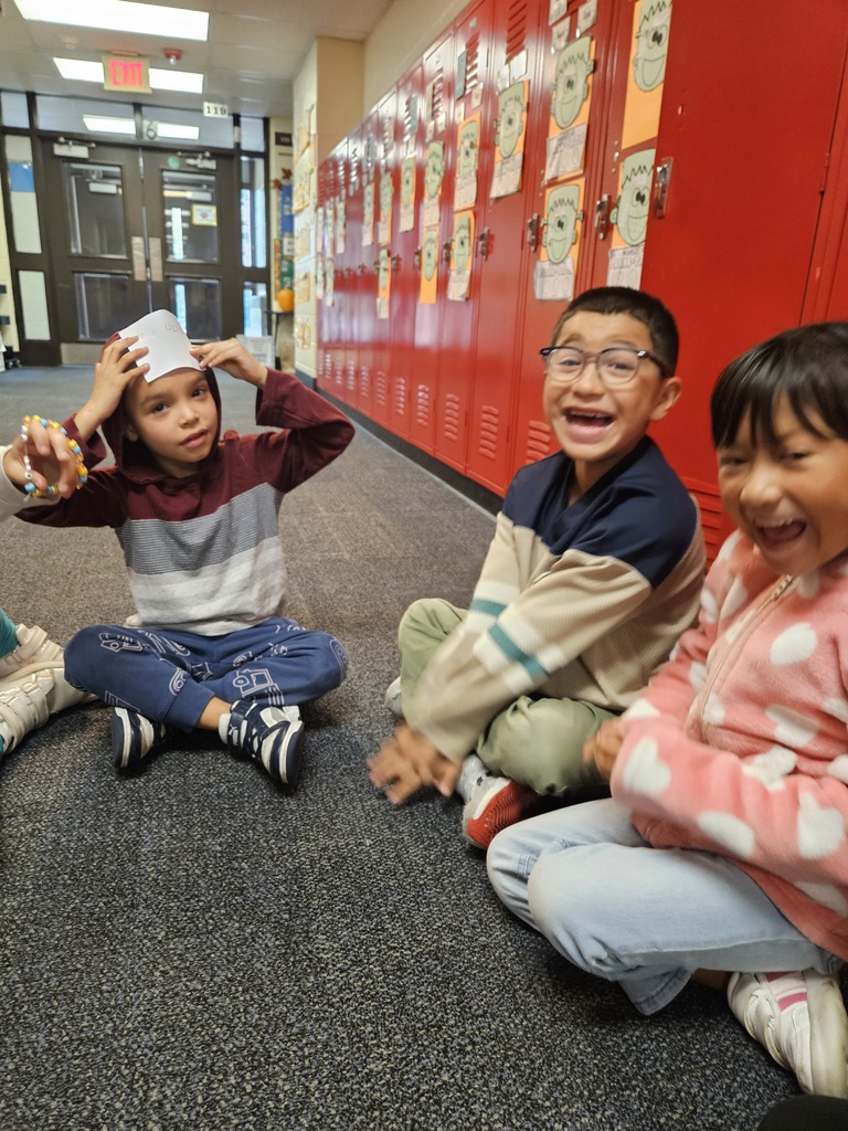 Students laughing in the hallway