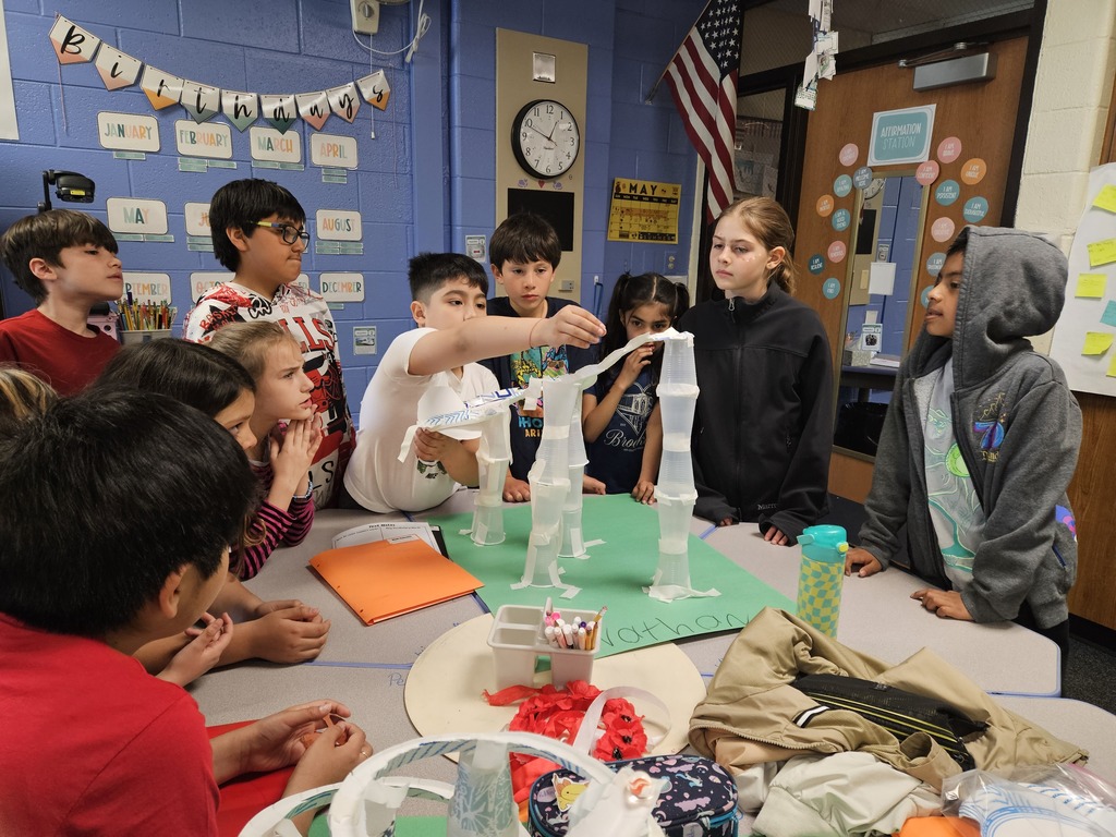 Students use cups to make new structures