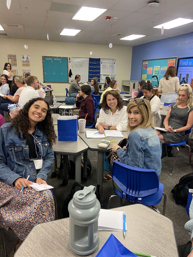 Teachers posing with each other