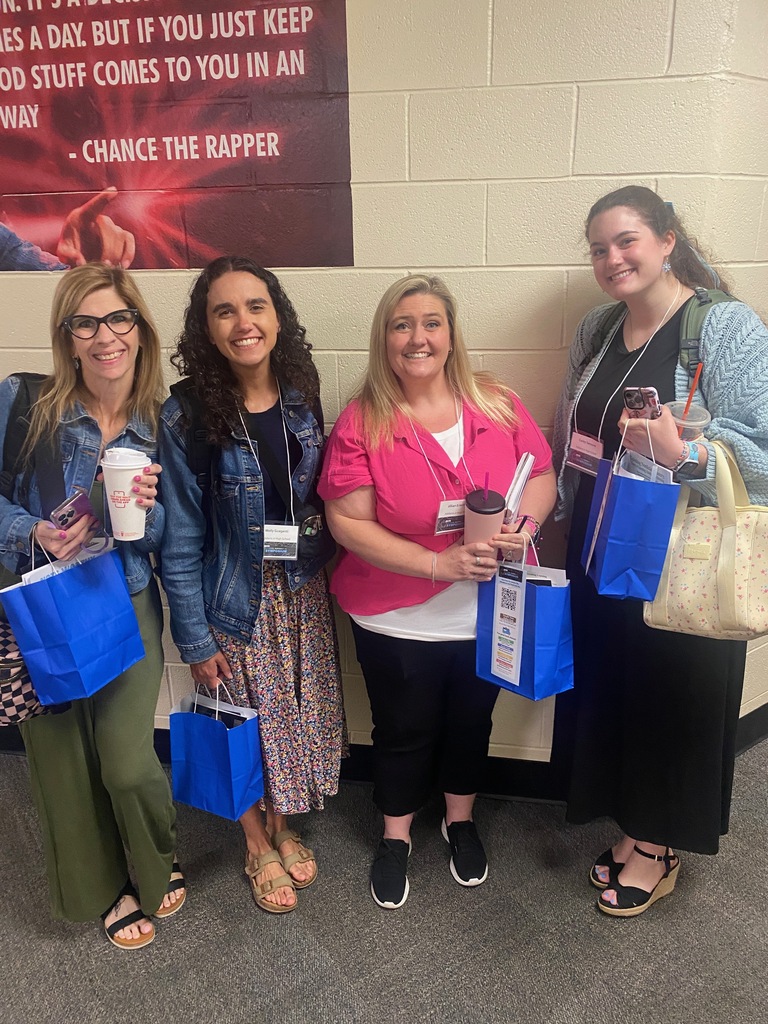 Teachers posing with each other