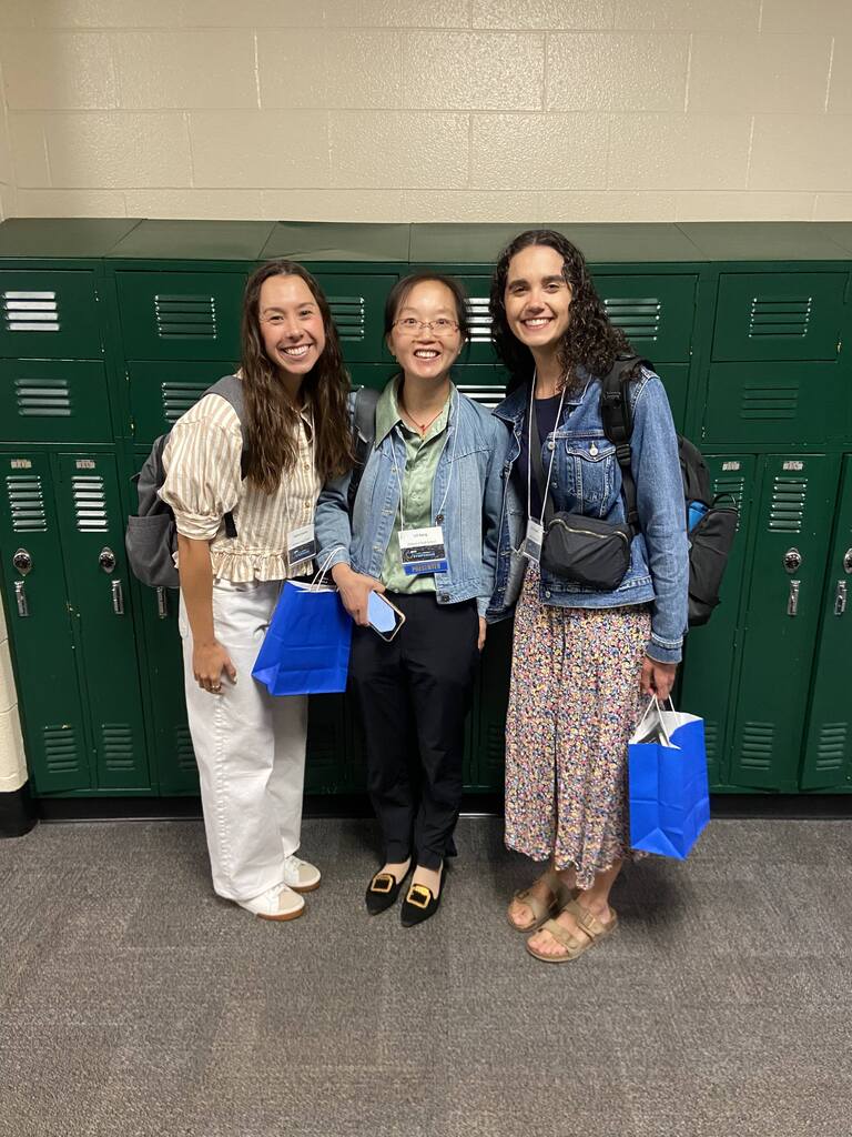 Teachers posing with each other