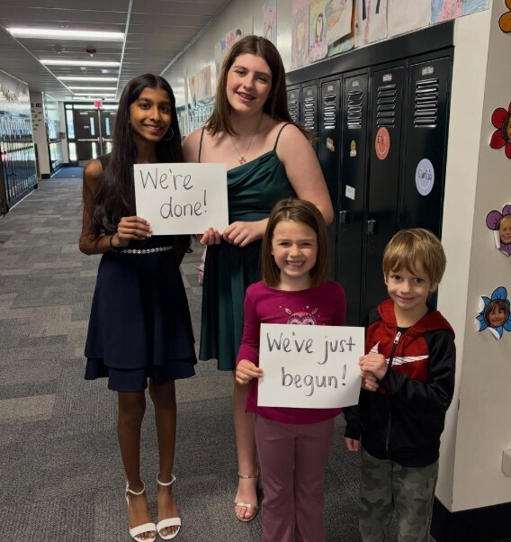 Two eighth-gradegirls and two young boys