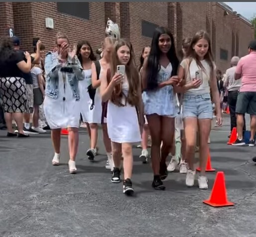 sixth-grade students walking out of Collins for the last time