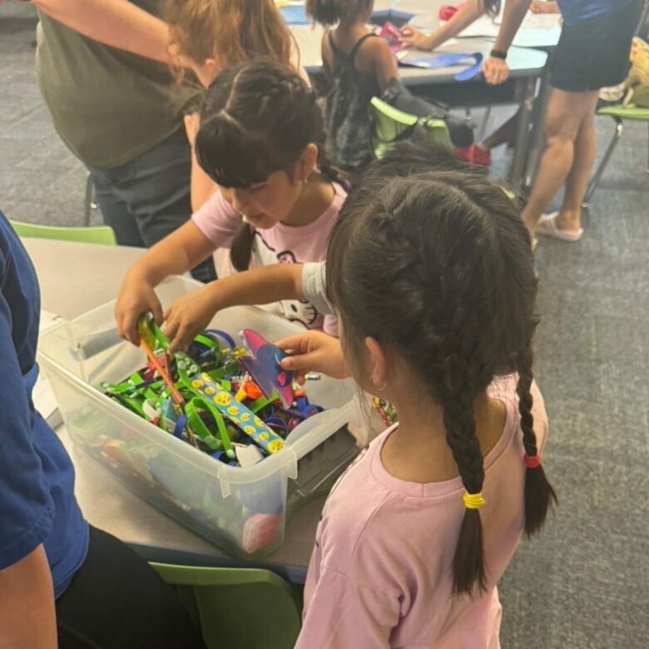students picking out a prize