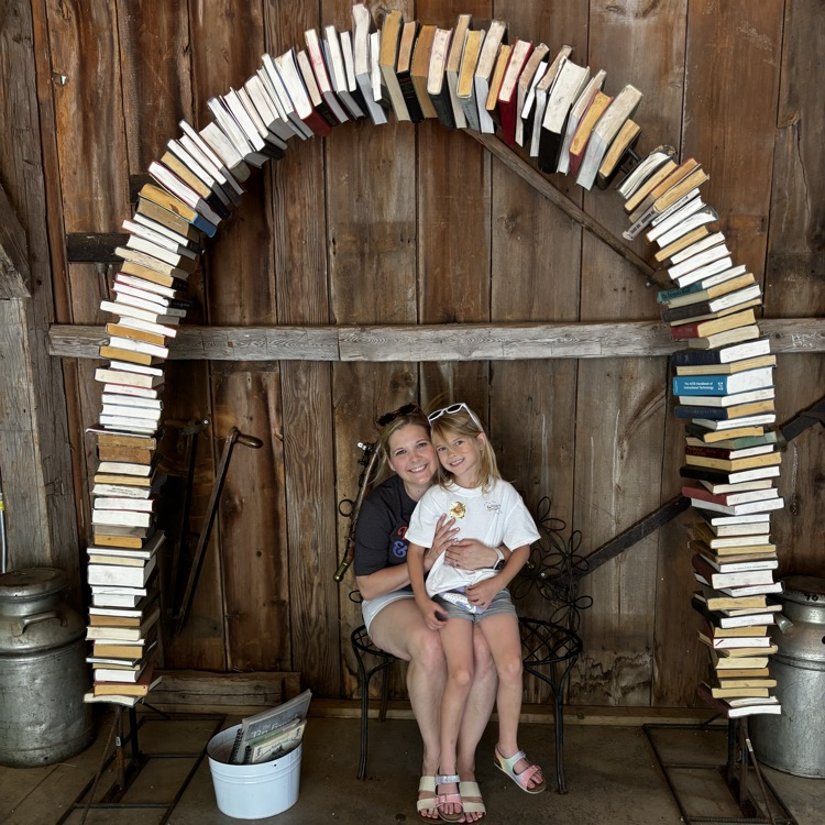 people under book arch