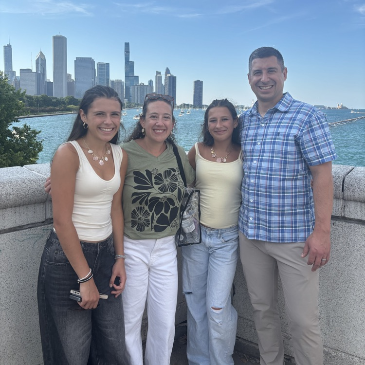 family with a city background 