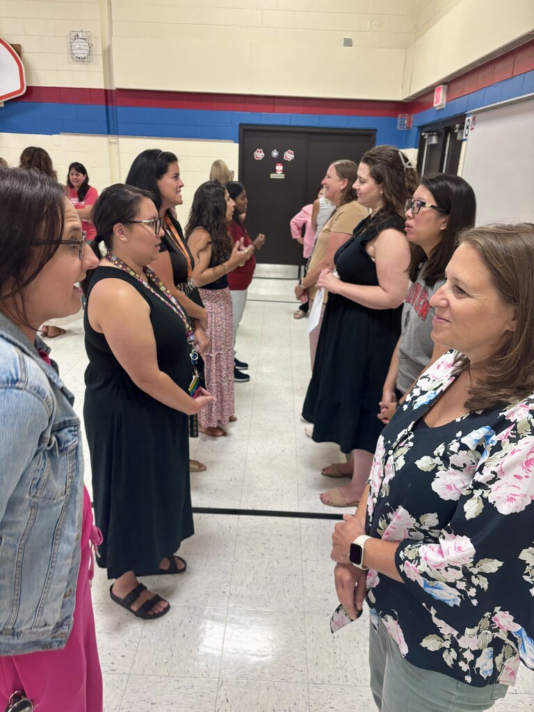 Two lines of teachers facing each other
