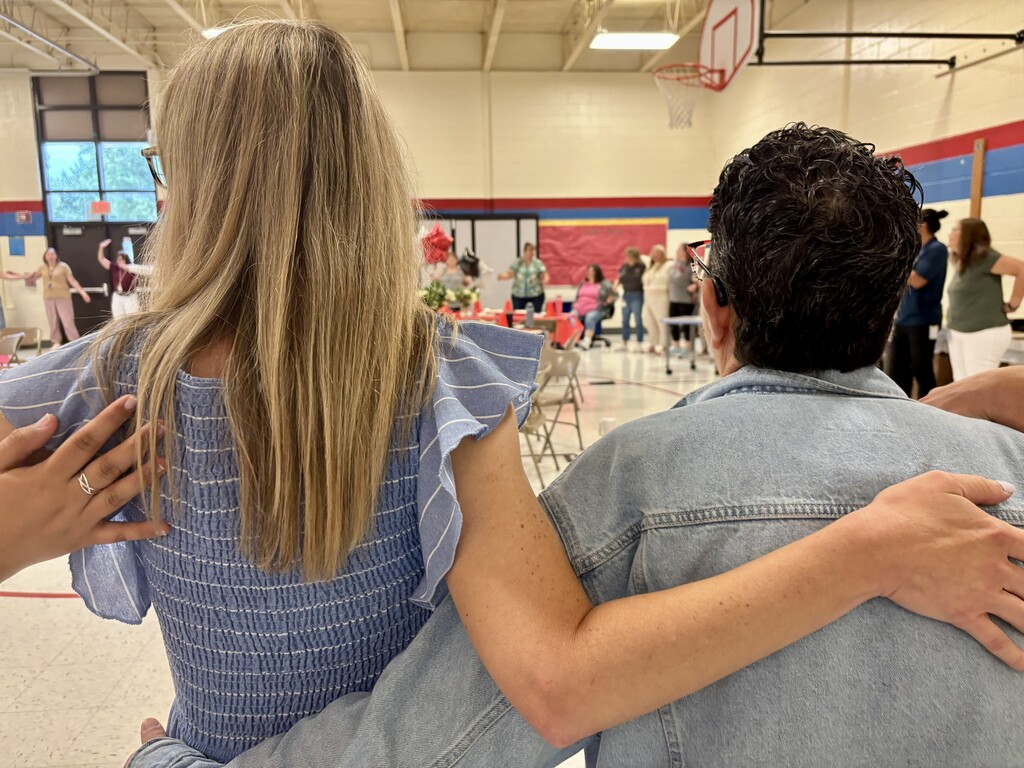 Teachers hugging
