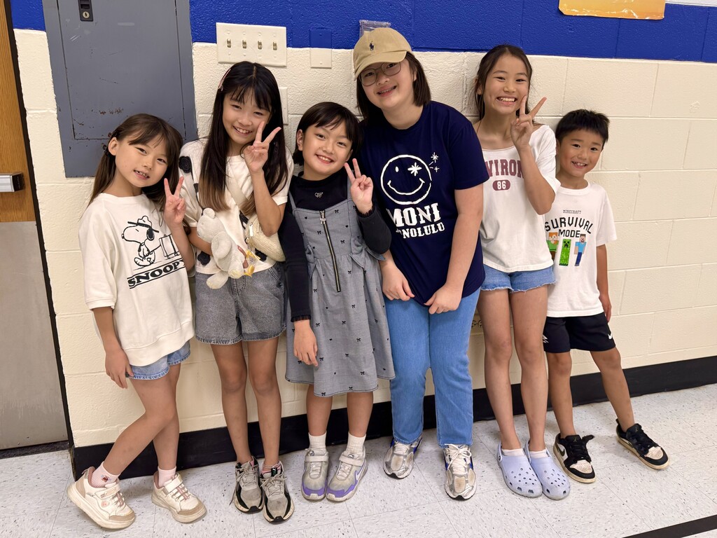 students smiling in gym