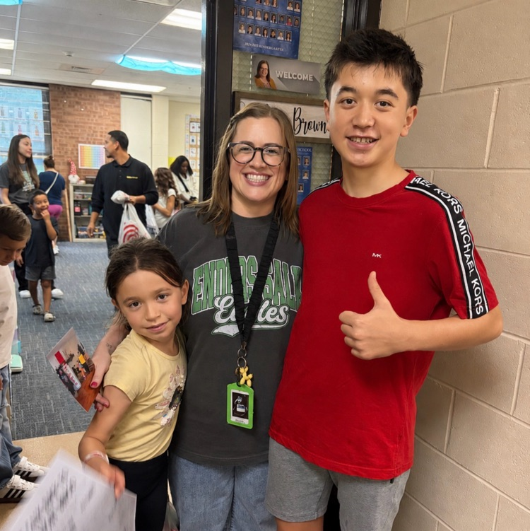 Mrs. brown with two students.