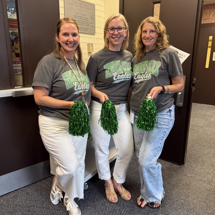 Mrs. Bullen, Mrs. Vassilos, and Mrs Schultz greeting students