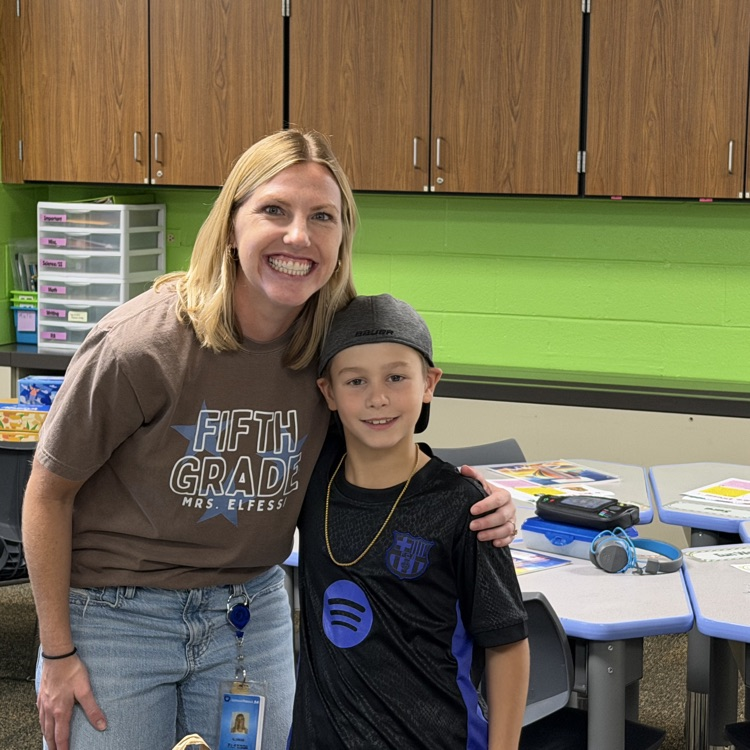 Teacher with student