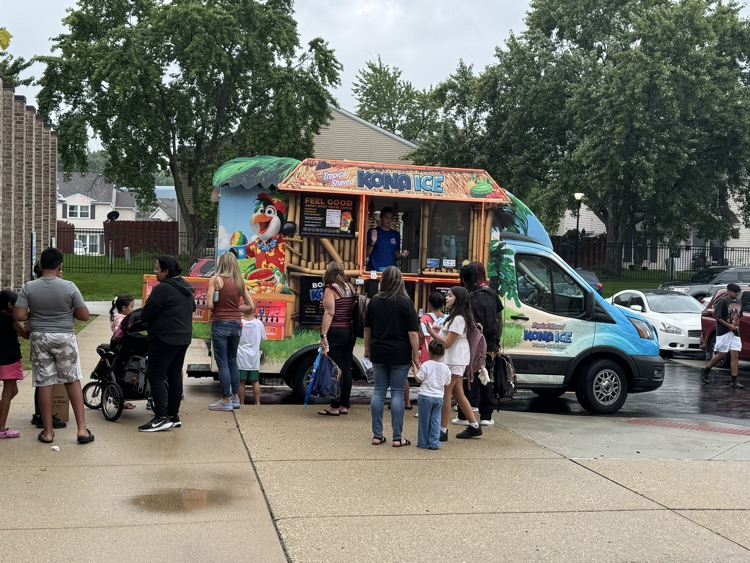people buying shaved ice from the Kona Ice truck