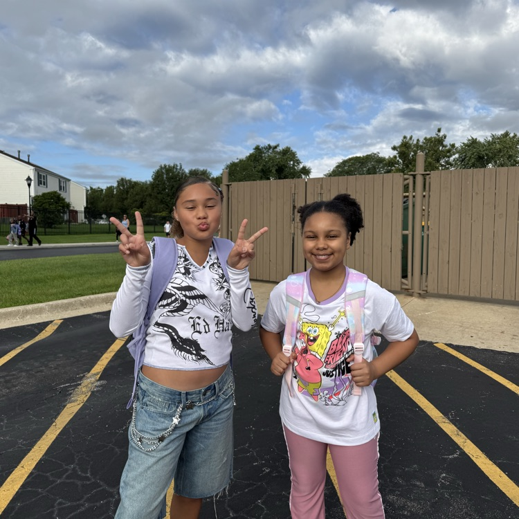 two girls smiling for the camera
