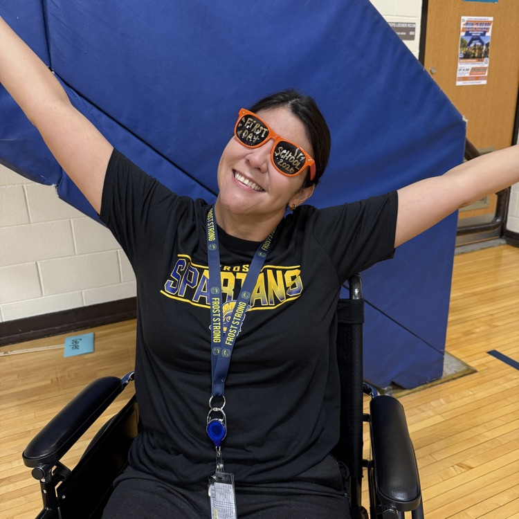 woman in wheelchair wearing orange sunglasses