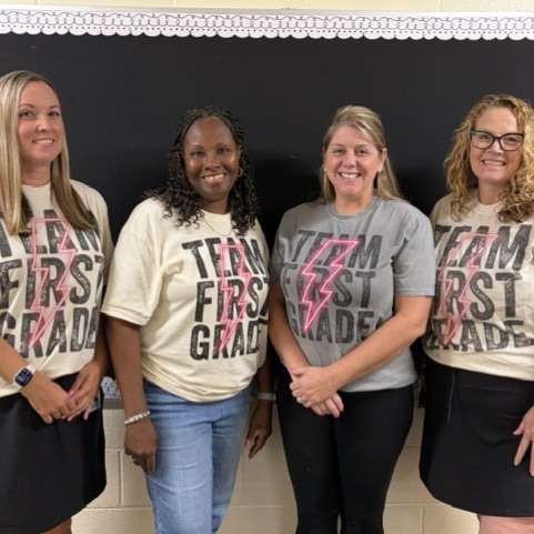 teachers together in smile pose