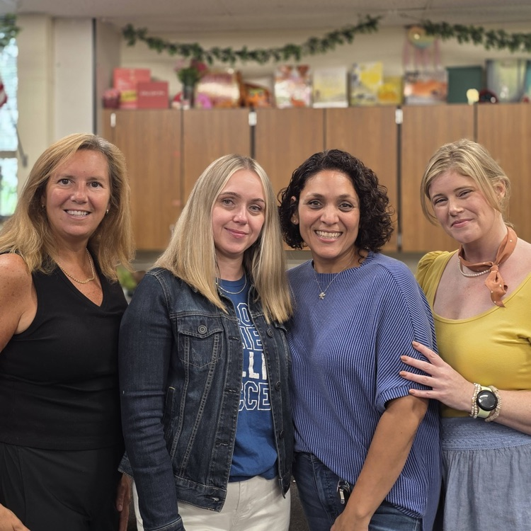 teachers smiling together 
