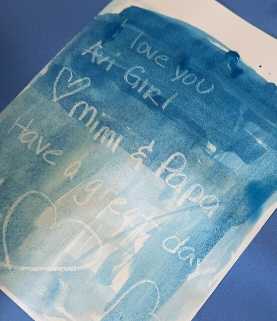 A revealed secret message that says: We love you. Have a great day.