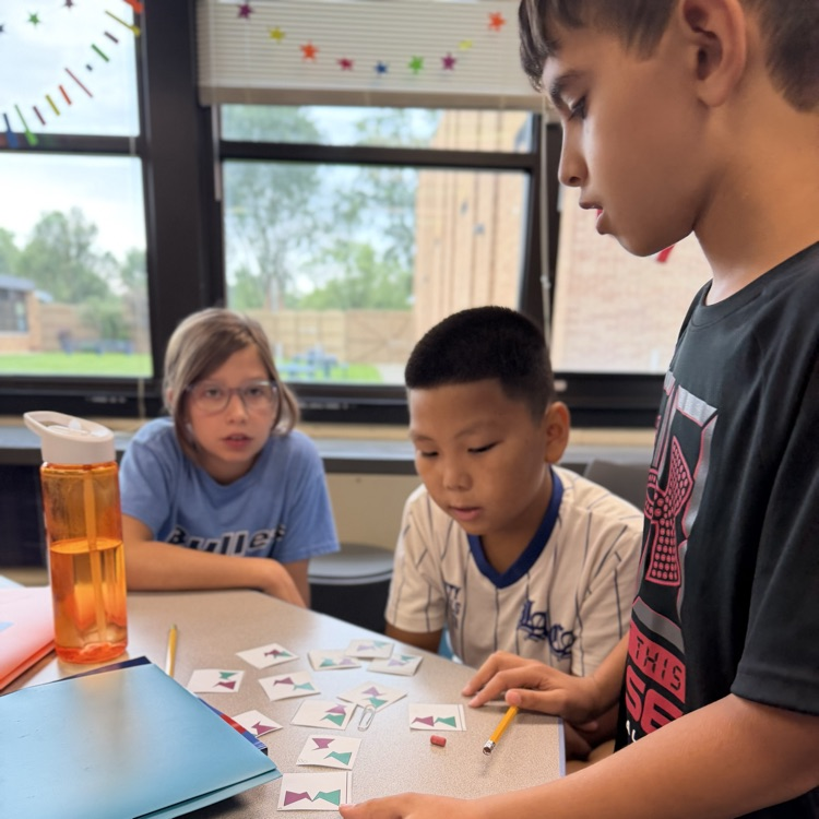 students sorting cards in math