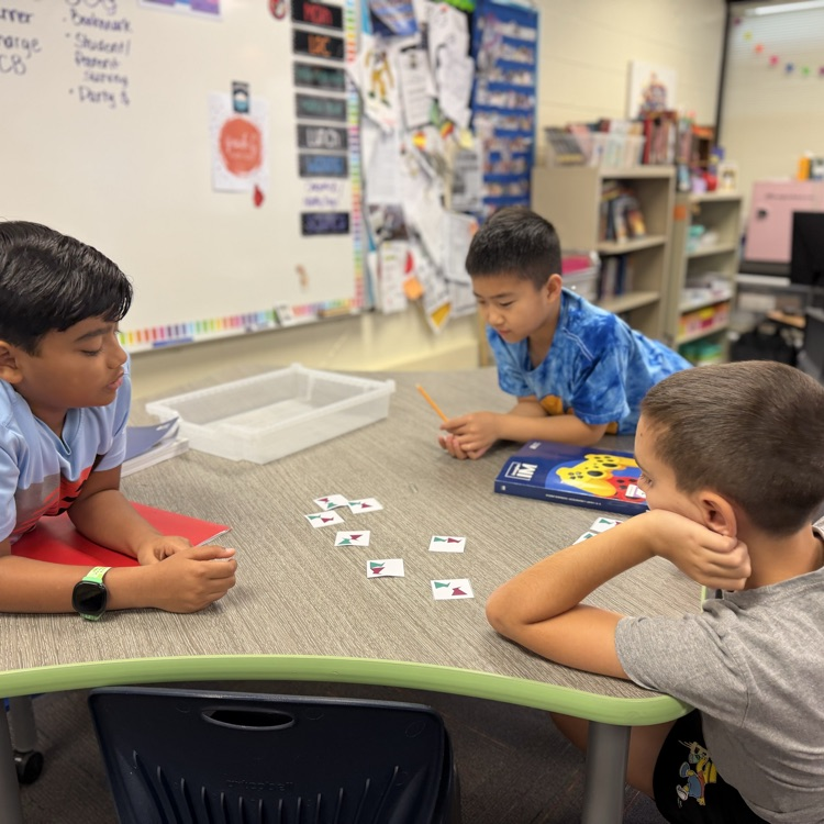 students sorting cards in math