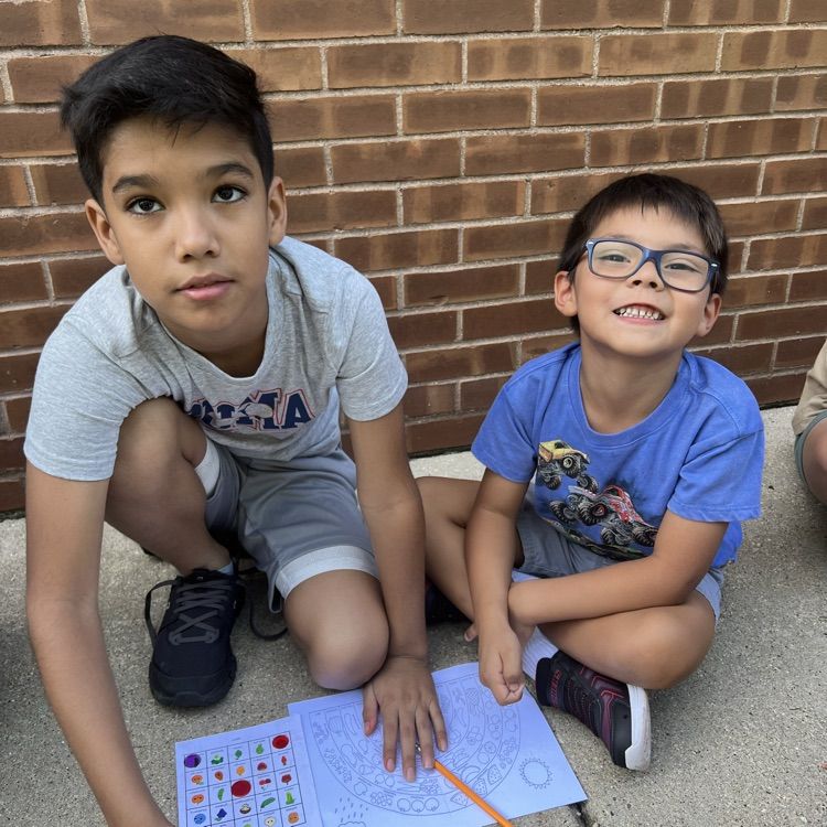 Students enjoying bingo outside.