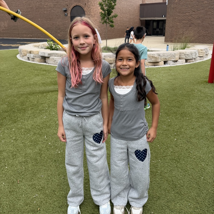 4th grade girls on playground in matching outfits