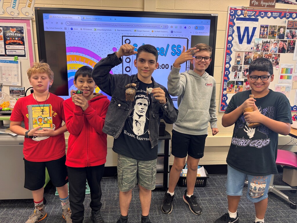 Students showing off their culture items