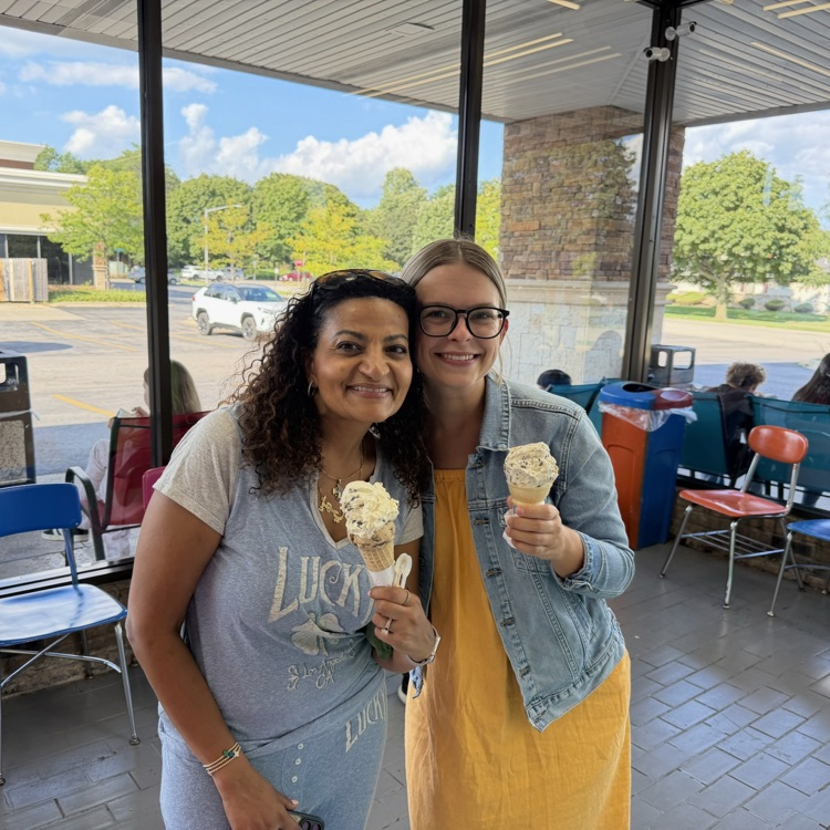 Mrs. Menias and Ms. Ostermann holding ice cream cones