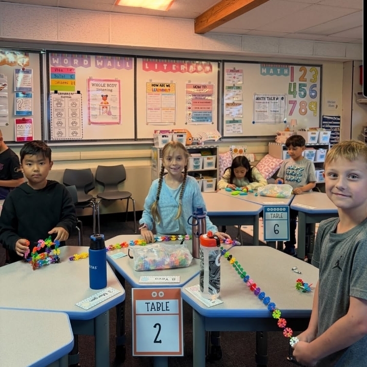 kids working together with math manipulatives
