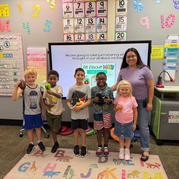 Miss Gomez and her small group students with their items