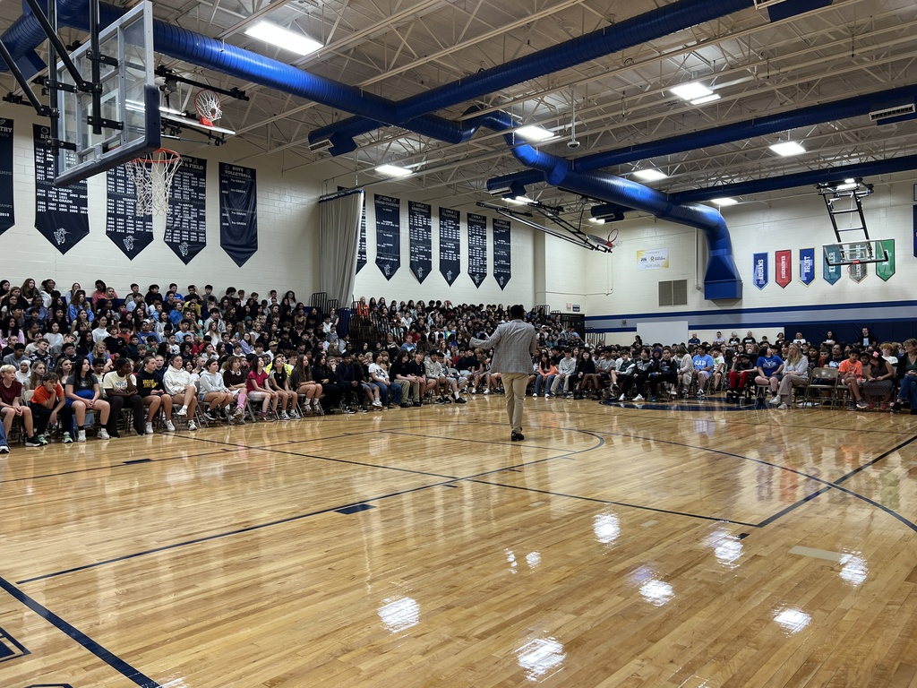 a speaker at a school assembly
