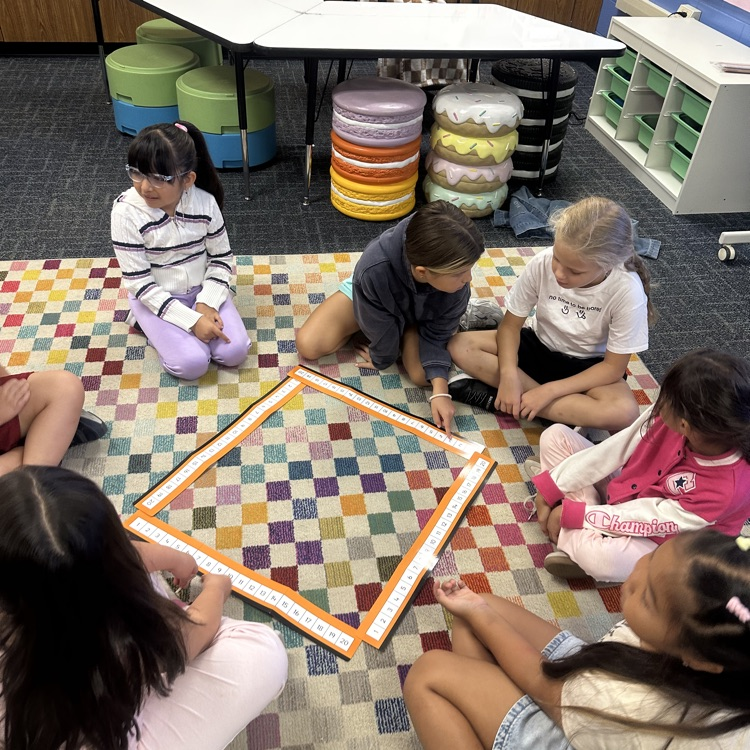 2nd graders making number lines.