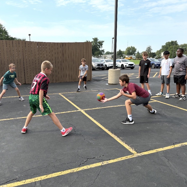 Group of 6th graders playing a team game.